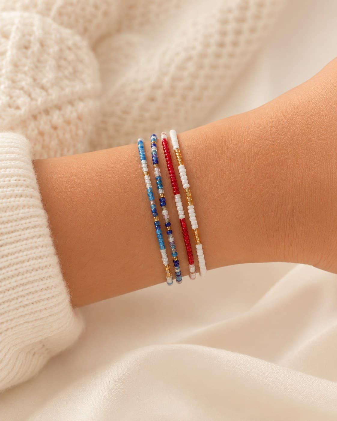 RWB bracelet stack worn on the wrist.