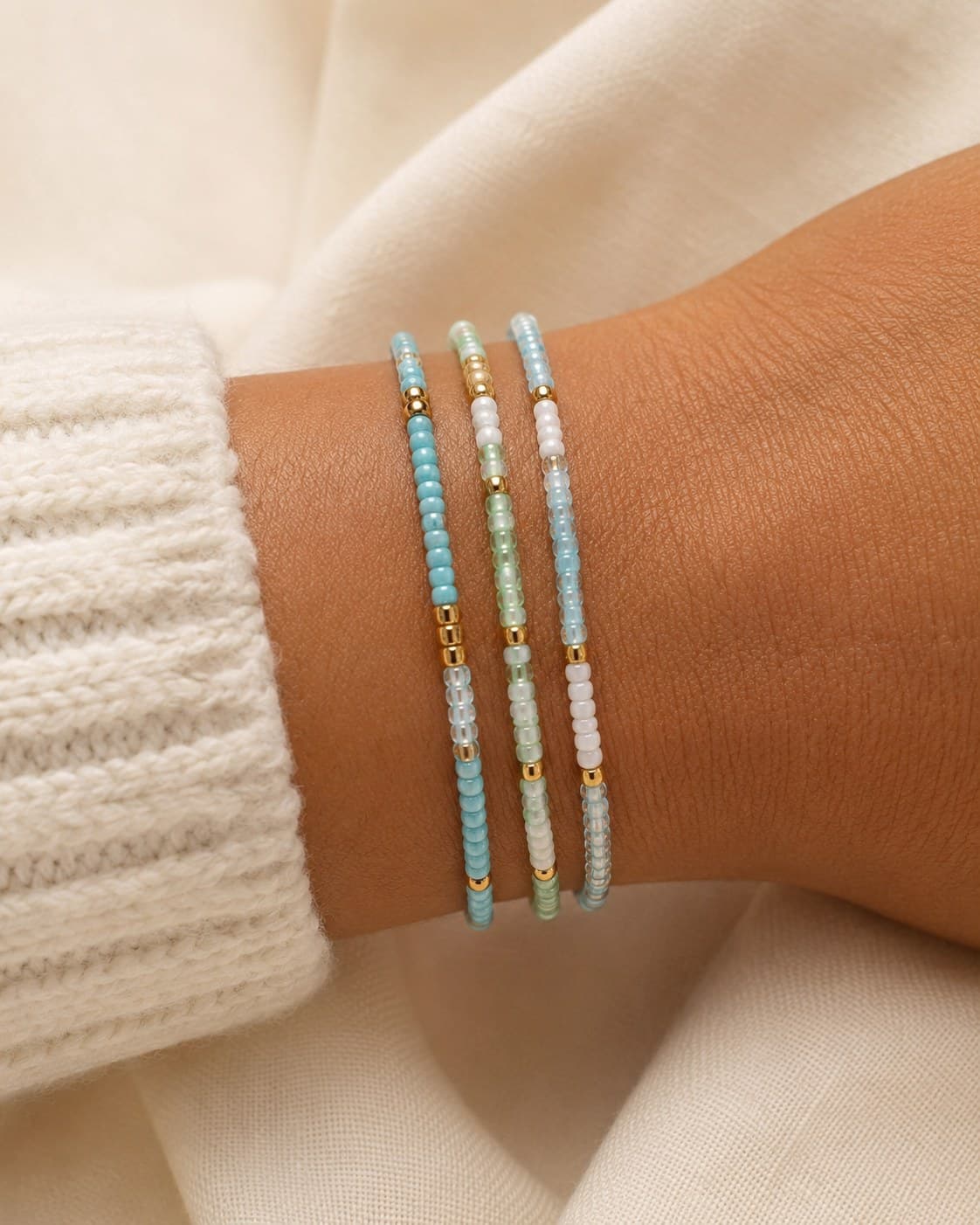 Turquoise Tower bracelet stack worn on the wrist.